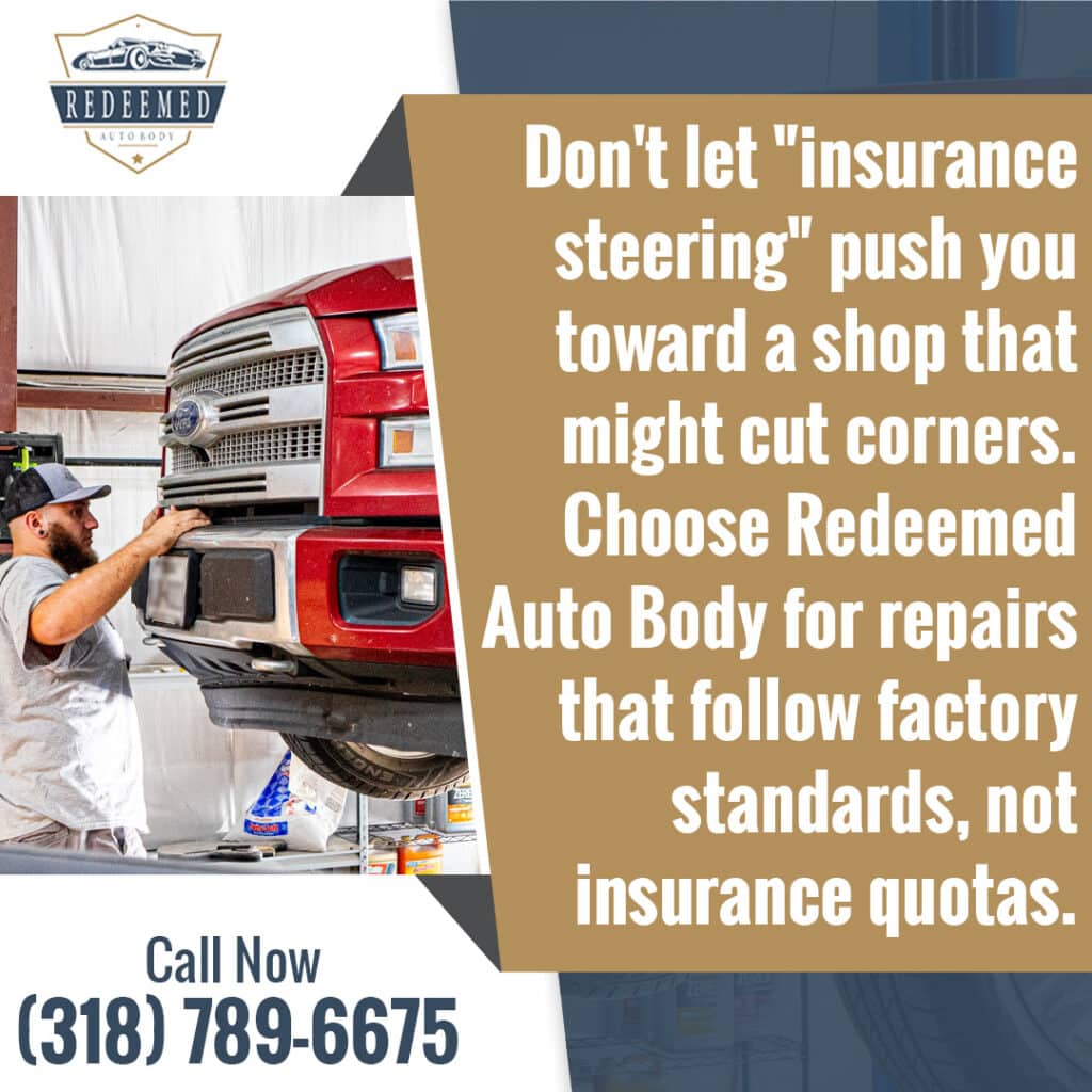 Technician repairing a red pickup truck at Redeemed Auto Body using factory-standard collision repair procedures
